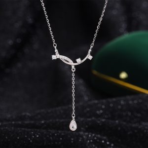 Sterling silver smiling tassel teardrop necklace for women, with a stylish curved design and clavicle chain.